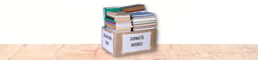 A box full of book donations.
