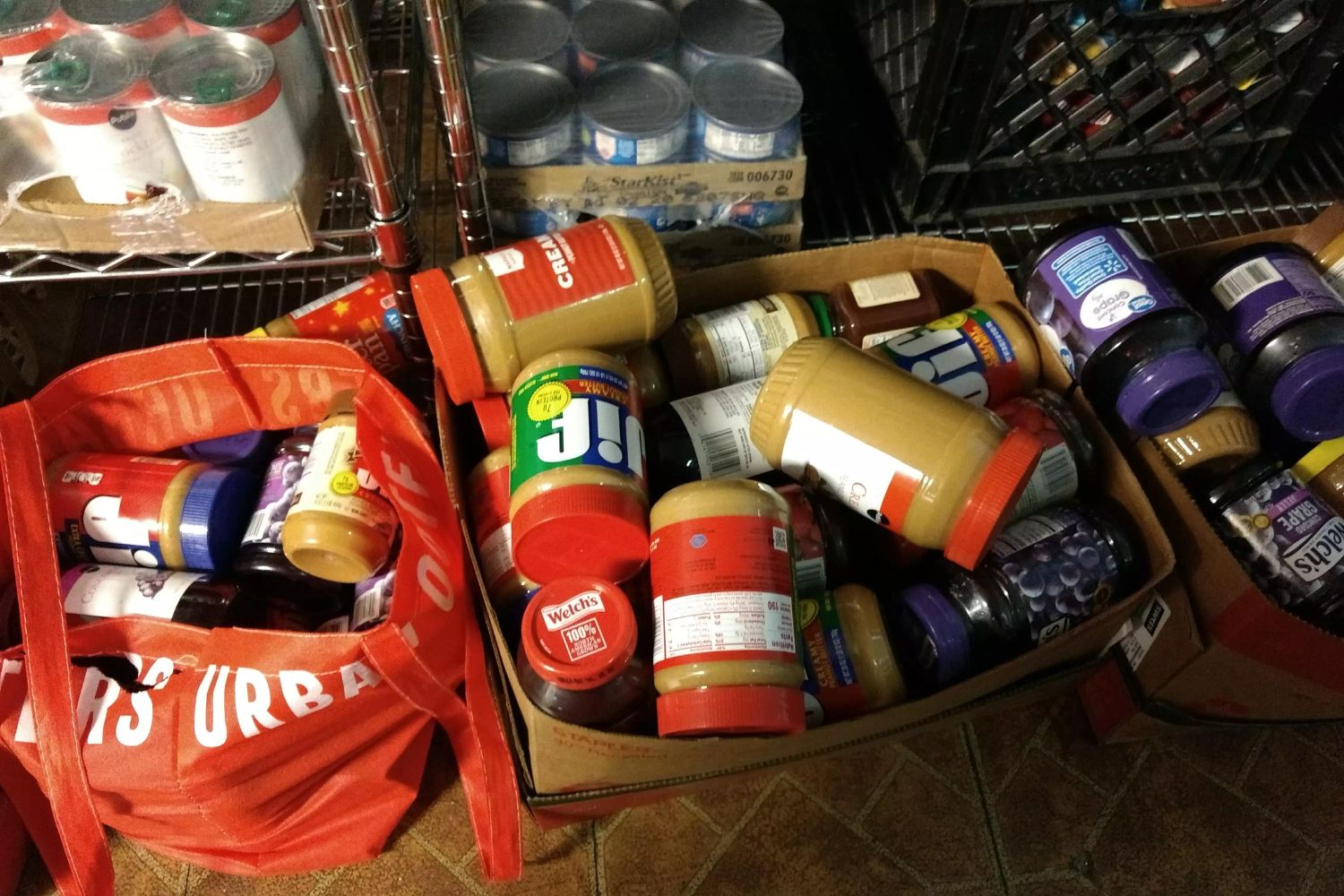 Food donations placed in boxes.
