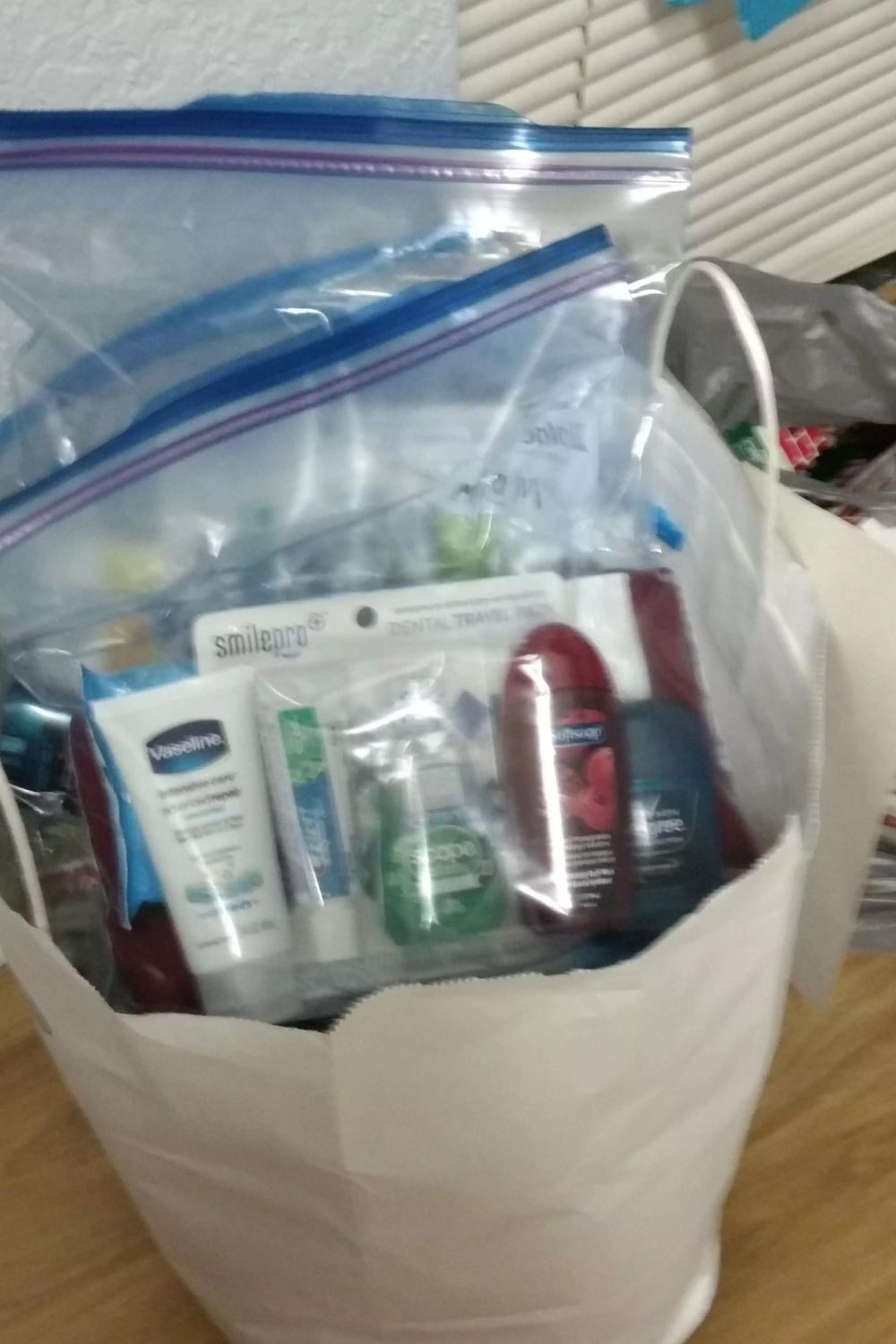 Toiletry donations placed in bags at the soup kitchen.