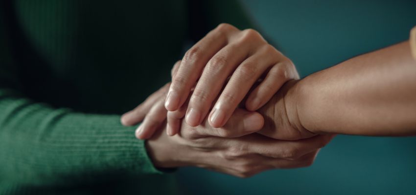 The two people held their hands to showed how much they cared for each other.