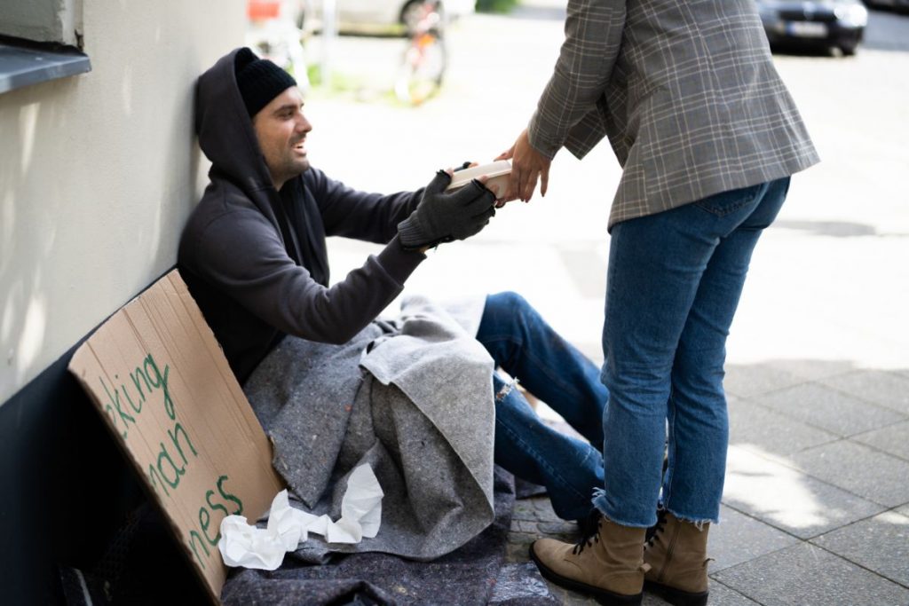 The person is helping people experiencing homelessness.