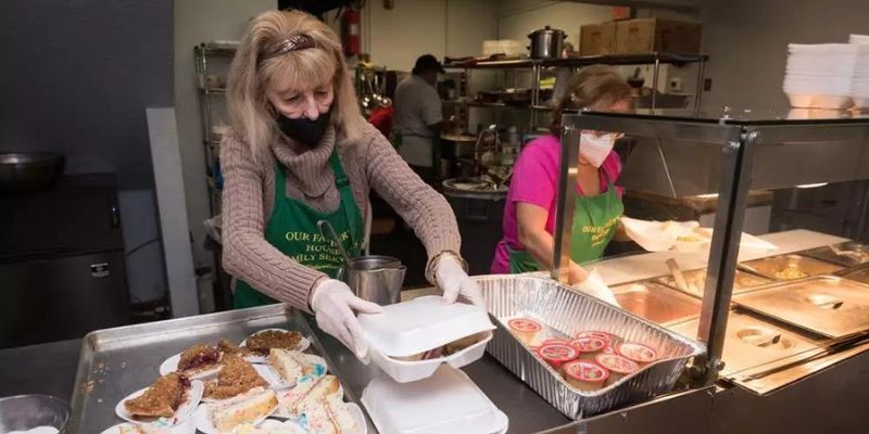 The person making food meals for people experiencing homelessness.