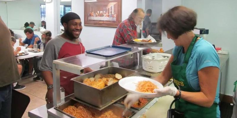 Offer your time and assistance at homeless shelters or food banks to directly impact the lives of those in need.